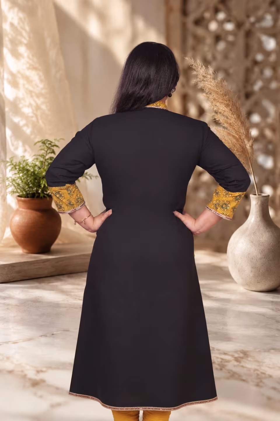 Back view of Bagru Block Print Pure Cotton Kurti in Black and Mustard
