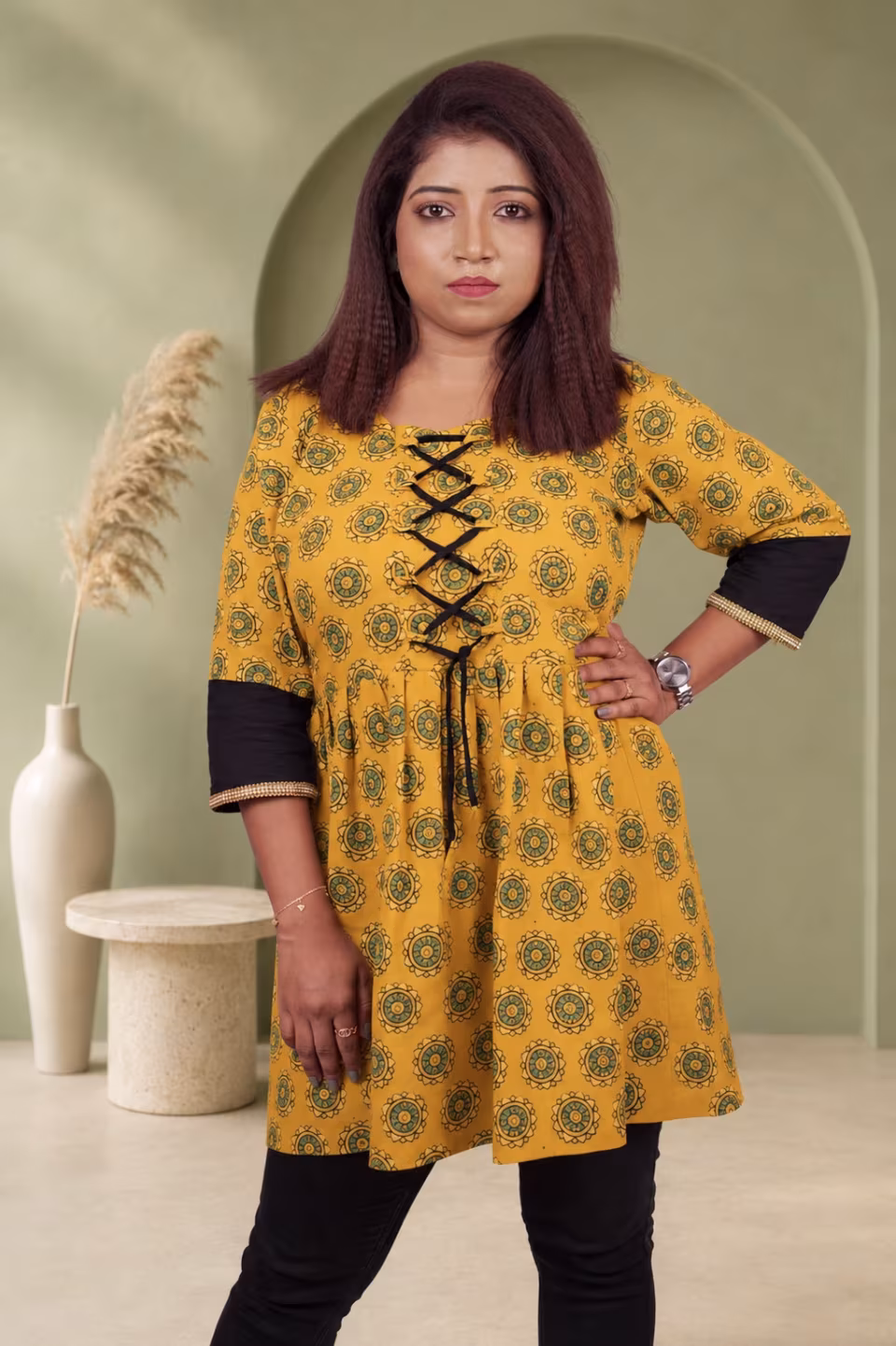 Women's mustard yellow Bagru block print A-line kurti with black lace-up front and contrast sleeves — main product image