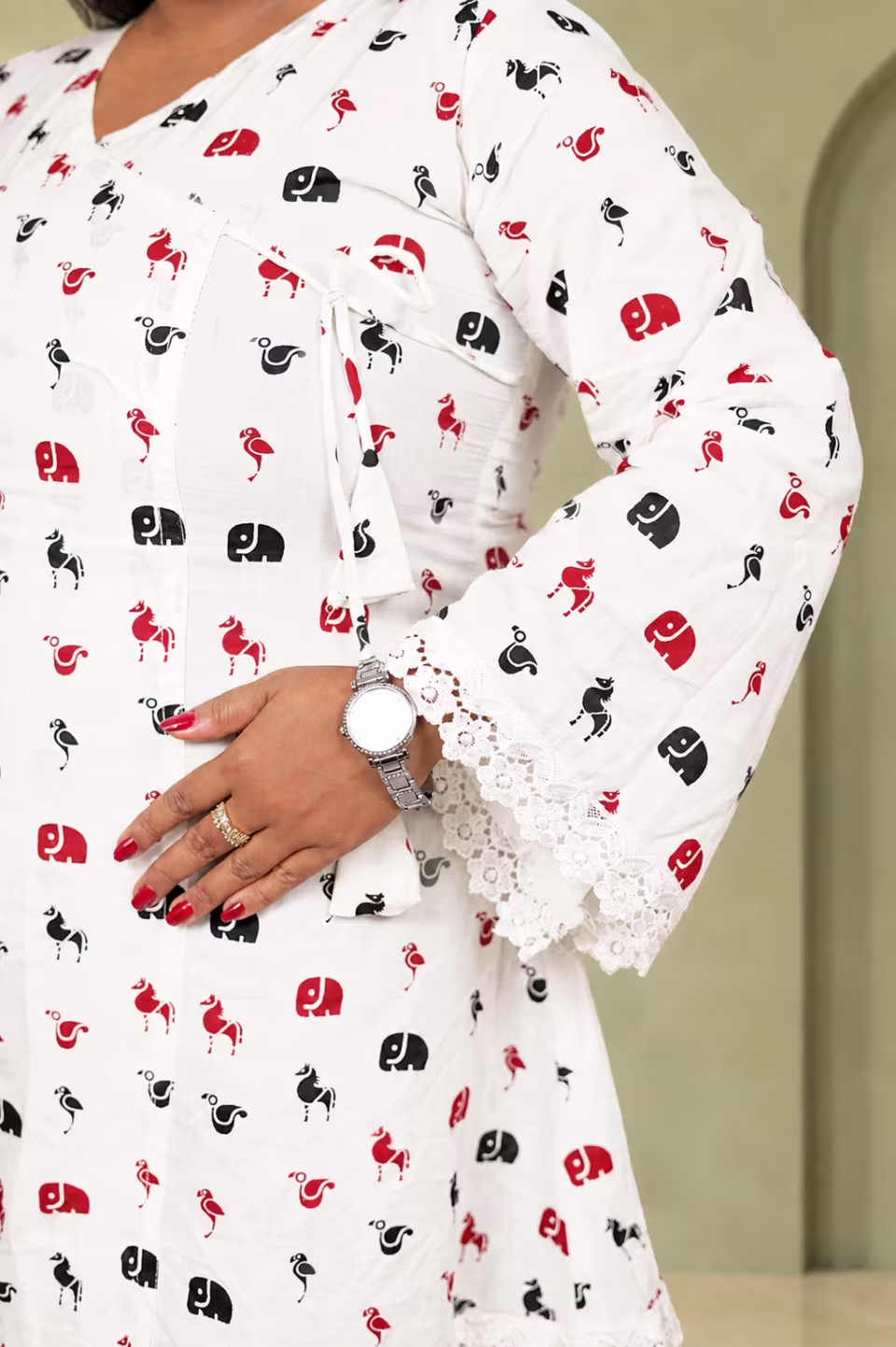 Close-up of front tie-up strings and elephant print pattern on cotton angrakha kurti
